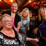 Sue Brauch, (left) a bartender for more than 50 years, is joined and celebrated by friends and colleagues Monday at Patty&rsquo;s Eggnest, the longtime Chuckwagon Inn, on Evergreen. Behind Brauch at left is new bartender Tricia Flood, her mother and customer Linda Flood, restaurant manager Pam Gahan, and loyal customer Dwight Jeffries. Brauch, 76, is retiring this week after 13 years behind the bar at the Everett lounge and restaurant. (Dan Bates / The Herald)