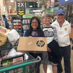 Cascade High graduate Maritza Lauriano Ortega (left) worked with Rotarians Janice Ellis and Ralph Quaas to choose her College Essentials purchase of a laptop computer. (Contributed photo)