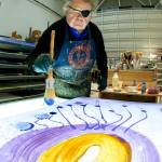 In this March 23 photo, glass artist Dale Chihuly works on a piece titled, &ldquo;Glass on Glass,&rdquo; in one of his studios in Seattle. (AP Photo/Ted S. Warren)
