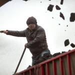 A worker guides a conveyor as it loads coal into a truck at a coal mine near Ordos in northern China&rsquo;s Inner Mongolia Autonomous Region. The world&rsquo;s biggest coal users &mdash; China, the United States and India &mdash; boosted coal mining in 2017 in an abrupt departure from last year&rsquo;s record global decline for the heavily polluting fuel. (AP Photo/Mark Schiefelbein, File)