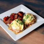 It&rsquo;s hard to go wrong with eggs Benedict and sweet potato home fries, served for brunch at Revolve True Food in Bothell. (Photo by Cherelle Ashby)