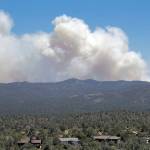 A wildfire burns near Mayer, Arizona, on Wednesday as seen from Prescott Valley. The fire has forced the evacuation of several communities. (AP Photo/Matt York)