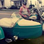 In this 2010 photo provided by the family of Arthur Werner Sr., Werner poses for a photo on his 1990 Harley-Davidson Heritage Softail motorcycle in Bethlehem, Pennsylvania. Werner, of Steel City, died of cancer Sunday, but made plans to be buried in his motorcycle&rsquo;s sidecar after his funeral, which is scheduled for Friday. (Brittany Werner via AP)