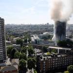 Smoke billows from a fire on Wednesday that engulfed the 24-story Grenfell Tower in west London. (Victoria Jones/PA via AP)