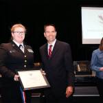 Navy Junior ROTC Cadet Eleanor Wilde earns a Presidential Volunteer medal for 294 hours of community service in one year, presented by Marysville Mayor Jon Nehring. (Contributed photo)