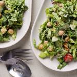 This salad gets its inspiration from the elements that fill a falafel sandwich. It is topped with crispy, spiced chickpeas and a tahini dressing. (Photo by Deb Lindsey for The Washington Post)