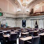 This May 23 photo shows Republican Sen. Joe Fain (far right) speaking in a mostly empty Senate chamber during adjournment of a 30-day special legislative session in Olympia. (AP Photo/Rachel La Corte)