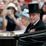 Queen Elizabeth II (left) and Prince Philip return to Buckingham Palace in a carriage on Saturday after attending the annual Trooping the Colour Ceremony in London. (AP Photo/Kirsty Wigglesworth, File)
