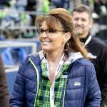 Sarah Palin, political commentator and former governor of Alaska, walks on the sideline before an NFL football game between the Seattle Seahawks and the Los Angeles Rams in Seattle in December. (AP Photo/Scott Eklund, File)