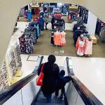 Customers ride the escalator at a Sears store in St. Paul, Minnesota, in March. (AP Photo/Jim Mone)