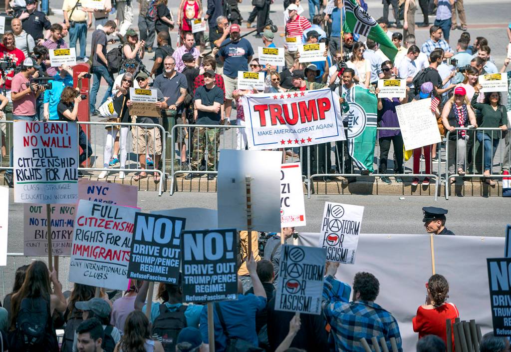 Demonstrators against Islamic law (background) gather in New York on Saturday, June 10, as counter demonstrators line up across Centre St., foreground. (AP Photo/Craig Ruttle)