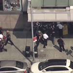 In this image taken from video, emergency personnel converge on Bronx Lebanon Hospital in New York after a gunman opened fire there on Friday. (NBC 4 New York via AP)