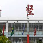 In this June 18 photo, Chinese, American and other international flags stand at the factory of Ganzhou Huajian International Shoe City Co., which has made shoes for the Ivanka Trump brand, in Ganzhou in southern China&rsquo;s Jiangxi Province. (AP Photo/Andy Wong)