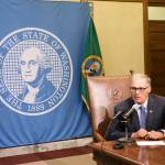 Gov. Jay Inslee talks to reporters about ongoing budget negotiations Tuesday in Olympia. (Rachel La Corte / Associated Press)