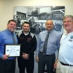 Rodland Toyota Service Manager Jason Sundet (from left) was presented with a Patriot Award by employee and reservist Joseph Young along with Greg Leonard and John Van Dalen of the Washington Employer Support of the Guard and Reserve Committee. (Contributed photo)