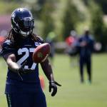 Seahawks running back Eddie Lacy tosses the football during practice on June 2, 2017, in Renton. (AP Photo/Ted S. Warren)