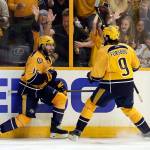 Predators right wing Craig Smith (15) celebrates his goal with Filip Forsberg (9) during the third period of Game 3 of Stanley Cup Finals against the Penguins on June 3, 2017, in Nashville, Tenn. (AP Photo/Mark Humphrey)