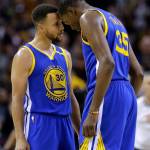 The Warriors&rsquo; Stephen Curry (left) and Kevin Durant celebrate in the final moments of Game 3 of the NBA Finals against the Cavaliers on June 7, 2017, in Cleveland. (AP Photo/Tony Dejak)