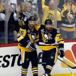 The Penguins&rsquo; Ron Hainsey (left) celebrates his goal against the Predators with Phil Kessel during the second period of Game 5 of the Stanley Cup Final on June 8, 2017, in Pittsburgh. (AP Photo/Gene J. Puskar)