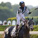 Jose Ortiz celebrates after riding Tapwrit to victory in the 149th running of the Belmont Stakes on June 10, 2017, in Elmont, New York. (AP Photo/Mary Altaffer)