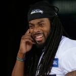 Seahawks cornerback Richard Sherman stands in a doorway following a minicamp practice on June 9, 2017, in Renton. (AP Photo/Ted S. Warren)