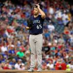 Mariners starting pitcher James Paxton (65) pauses on the mound as he works against the Rangers in the third inning of a game June 16, 2017, in Arlington, Texas. (AP Photo/Tony Gutierrez)