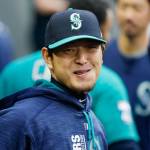 Mariners pitcher Hisashi Iwakuma smiles as he stands in the dugout before a game against the White Sox on May 19, 2017, in Seattle. (AP Photo/Ted S. Warren)