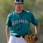Mariners pitcher Andrew Moore throws during spring training practice Feb. 21, 2017, in Peoria, Ariz. (AP Photo/Charlie Riedel)