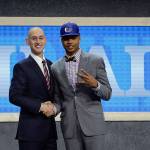 Washington&rsquo;s Markelle Fultz (right) poses for a photo with NBA Commissioner Adam Silver after being selected by the Philadelphia 76ers as the No. 1 pick during the NBA draft on June 22, 2017, in New York. (AP Photo/Frank Franklin II)