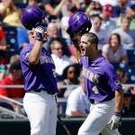 LSU&rsquo;s Josh Smith (4) celebrates with teammate Beau Jordan (24) after hitting a home run during the seventh inning of an NCAA College World Series game against Oregon on June 23, 2017, in Omaha, Neb. (AP Photo/Nati Harnik)