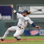 The Mariners&rsquo; Ben Gamel slides safely into third base as he advances from first on a hit by Mitch Haniger in the fourth inning of a game against the Twins on June 12, 2017, in Minneapolis. (AP Photo/Jim Mone)