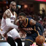 The Pacers&rsquo; Paul George (right) drives against the Cavaliers&rsquo; LeBron James during the second half of a game on April 2, 2017, in Cleveland. (AP Photo/Tony Dejak)