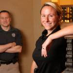 Ora Evans is a lateral transfer from the Vancouver, Washington police department. Her training officer, Sgt. Trevor Townsend, is behind her. (Kevin Clark / The Herald)