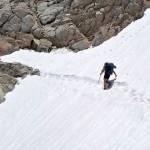 In this June 7 photo, Wesley Tils crosses a snowfield below Forester Pass in Sequoia National Park along the Pacific Crest Trail near Kings Canyon National Park, California. Hikers on the Pacific Crest Trail, on America&rsquo;s West Coast, have been detouring California&rsquo;s high Sierra in droves this year because of persistent snow and raging creeks. (Jake Gustafson via AP)