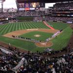 The Chicago White Sox and Seattle Mariners line the baselines at Safeco Field for the opening game of the 2002 Major League Baseball season. (AP Photo/Stevan Morgain)