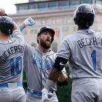 Tampa Bay&rsquo;s Steven Souza Jr. (center) celebrates with Corey Dickerson and Tim Beckham after hitting a grand slam against the Detroit Tigers during the third inning of their game Sunday in Detroit. (AP Photo/Duane Burleson)