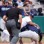 Everett&rsquo;s Andres Torres looks for the call as he tags out Hillsboro&rsquo;s Eudy Ramos Sunday afternoon at Everett Memorial Stadium in Everett on June 18, 2017. Aquasox won 6-3. (Kevin Clark / The Herald)