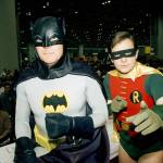 In this 1989 photo, actors Adam West (left) and Burt Ward, dressed as their characters Batman and Robin, pose for a photo at the &ldquo;World of Wheels&rdquo; custom car show in Chicago. (AP Photo/Mark Elias, File)