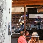 Judson Bartels leads the band during Sound Church on Sunday afternoon at The Anchor Pub in Everett. (Kevin Clark / The Herald)