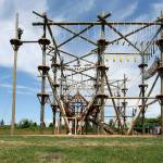 Thrill seekers climb the high ropes course at High Trek Adventures at Paine Field Community Park in Everett. (Kevin Clark / The Herald)