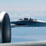 This is a photo of a Russian jet coming within a few feet of a U.S. Air Force reconnaissance jet over the Baltic Sea on June 19 in a maneuver that has been criticized as unsafe. (Master Sgt Charles Larkin Snr/U.S. European Command via AP)