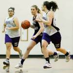 Seen here during a Feb. 2016 practice, Edmonds-Woodway&rsquo;s Missy Peterson (center) takes the ball up court during a team practice at the school. Originally signed to play for Long Beach State, she was allowed out of her commitment to follow the school&rsquo;s former coach to the University of Washington. (Ian Terry / The Herald)