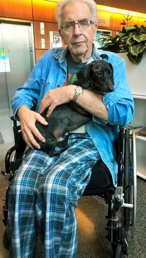 Dale Reiner, 75, requested time with his dog, Cosmo, at the hospital while recovering from a heart attack he suffered in April. (Family photo)