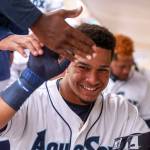 Everett&rsquo;s Joseph Rosa is congratulated for his home run Sunday afternoon at Everett Memorial Stadium in Everett on June 18, 2017. Aquasox won 6-3. (Kevin Clark / The Herald)