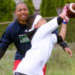 Tyler Lockett plays defense on a camper Saturday morning at Edmonds-Woodway High School. (Kevin Clark / The Herald)