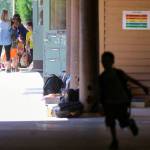 Students leave school for the final full day of classes at Salem Woods Elementary in Monroe on Thursday. (Kevin Clark / The Herald)