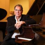 Lloyd Boyd inherited about 40 vintage pianos from his brother Ronald, who died last year after a long career of sales and restoration in Washington, D.C. (Kevin Clark / The Herald)