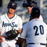 Everett manager Jose Moreno (right) makes his way to the mound to relieve pitcher Randy Bell (left) with catcher Troy Dixon in the second inning on June 27, 2017, at Everett Memorial Stadium in Everett. (Kevin Clark / The Herald)