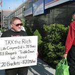 In this April 17, 2012 photo, James Hodgkinson of Belleville protests outside of the United States Post Office in Downtown Belleville, Illinois. (Derik Holtmann/Belleville News-Democrat, via AP)