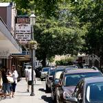 Edmonds Theater is visible along Main Street in downtown Edmonds. From the roundabout that serves as the hub of downtown Edmonds, Main Street continues west to the ferry dock, which offers a 30-minute trip to nearby Kingston. (Ian Terry / The Herald)